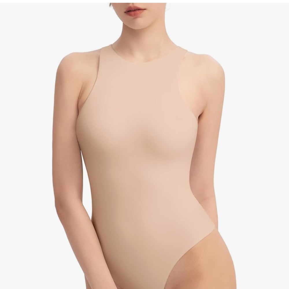 Women’s tank bodysuit snap at crotch, very stretchy material. Size L